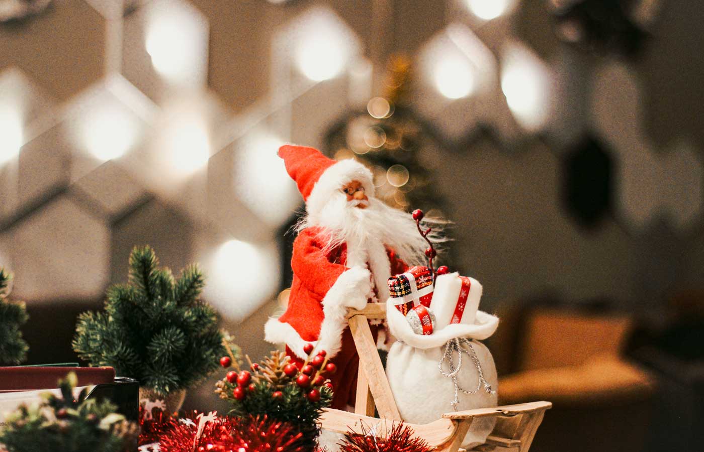 an ornament of Santa Claus on top of a wooden table